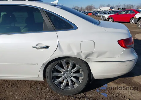 2009 Hyundai Azera Limited z USA, uszkodzony, nr VIN KMHFC46F09A374003